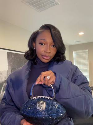 A post by @kjaejones on TikTok caption: It feels amazing… #NFLGameDayOutfits #f#fashiontokn#nflwifef#footballpurseoutfitcheck #kaylajones