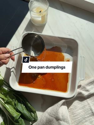 A post by @healthygirlkitchen on TikTok caption: bookmark ONE PAN DUMPLINGS (15 minute dinner) 🥟🌿🥢follow @healthygirlkitchen for more!!  Sauce:  2 cloves minced garlic  3 tbsp soy sauce  1 tsp ginger  2 tbsp red curry paste  1 tbsp toasted sesame oil  1 tbsp rice vinegar  1 cup water  1/4 cup coconut cream  16 Oz package favorite dumplings  2 cups chopped bok choy  Garnish: Scallions Cilantro Chili oil I use momofuku chili crunch  Sesame seeds  Use 9x9 baking dish. Bake covered 15 min at 375 F. #onepot #dumplings #DinnerIdeas 