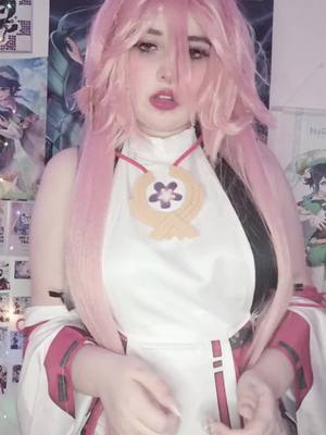 A post by @ac3c0s on TikTok caption: rawr #cosplayer #yaemikocosplay #yaemikogenshinimpactcosplay #genshin #fyp #genshincosplay #genshin #raidenshogungenshinimpact 