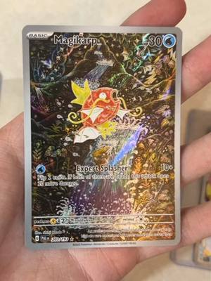 A post by @maxalinafrttv on TikTok caption: IONO AND MAGIKARP??? #pokemon #trending #pokemoncards #pokemontiktok #pokemoncommunity #pokemontcg #pokemonpaldea #magikarp #iono 