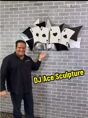 A post by @tonyviscardi on TikTok caption: This sculpture is an extraordinary creation by artist Tony Viscardi for friend and DJ in Miami, DJ Ace. This sculpture is both stunning and evocative. It features meticulously sanded aluminum, thick glossy black resin, and translucent smoked glass components. #tonyviscardi #viscardidesigns #ContemporaryArt 