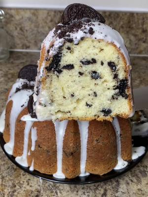 A post by @rd_eats on TikTok caption: This Oreo poundcake was always the first thing to sell out at my bake sales and I’m gonna show y’all how to make it step by step🤍🤤  Ingredients: Pre Heat Oven to 325°F 3 cups all-purpose flour ½ teaspoon baking powder ½ teaspoon salt 3 sticks unsalted butter (room temperature), 3 cups sugar 5 large eggs room temp ¾ cup buttermilk 1 tablespoon vanilla extract 12 oreos crushed Frosting: 4oz cream cheese 1 1/2 cups powdered sugar 3 tbsps heavy cream