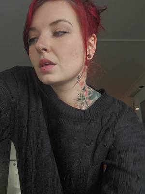 A post by @michelleneumann27 on TikTok caption: #ilovehaters #redhair #longnails #fy #tattoogirl❤️ #er 