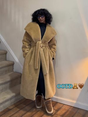 A post by @denahabib1 on TikTok caption: first fit of the year, super cute & cozy!🧸🤎➰ #blackgirlmagic #habeshatiktok #fyp #fypシ #fashiontiktok #outfitinspo #outfitideas #outfitinspiration #fitcheck #mouboots 