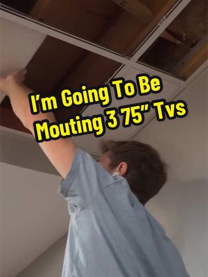 A post by @drewbuildsstuff on TikTok caption: I am going to mount 3 75” TVs for my Tv wall .This could be the ultimate gaming setup  #tv #tvwall #GamingSetup #build #DIY 