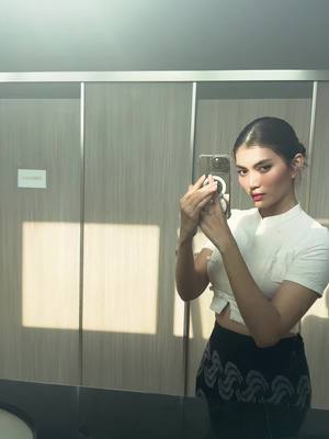 A post by @ninilineainofficial on TikTok caption: Public toilet မှာ tik tok ရိုက်သေးတာ👀#NiNiLinEain #OOTD 