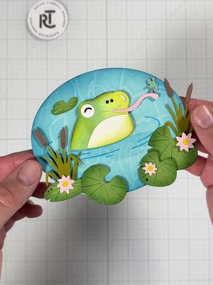 A post by @ralphtyndall on TikTok caption: Replying to @taylorhill220 Taylor has been faithfully requesting a frog card for what feels like two years now. This one is for you Taylor (and @JD). 🐸  #cardmaking #asmr #art #craft #DIY 