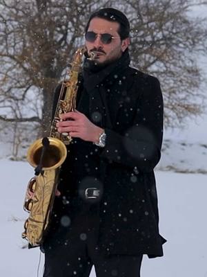 A post by @enzobuonauriosax on TikTok caption: ALL OF ME ❄️🤍🎷  #allofme #allofmejohnlegend #johnlegend #sax #saxophone #lovesong #foryoupage❤️❤️ #perte #snow 