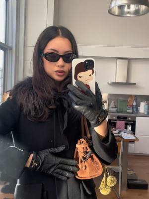 A post by @seldery on TikTok caption: really went full prada today 🎈💌 #fyp #prada 