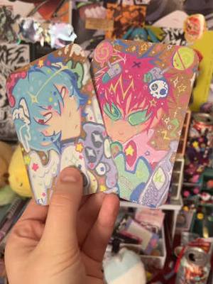 A post by @random.c.i on TikTok caption: Turing paintings into stickers 🤭 #stickermaking #reiayanami #saikik #neongenesisevangelion #animefanart #artsmallbusiness #arttips #stickers #cutetickers #decostickers 