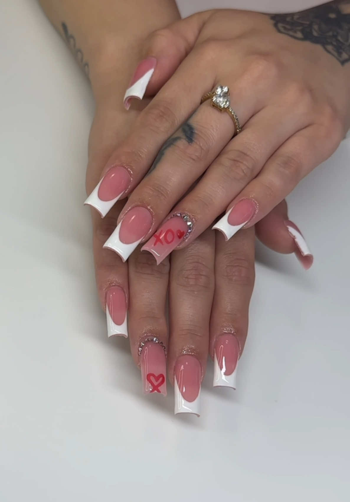 A post by @thanailldoll on TikTok caption: I love when I get my French the 1st time 💕 Discounts for the girls ☺️🎀 @Lé Moné Thenailldoll  @Ana Does Nailz Linda10 #nails #valentinesdaynails #whitenails #foryoupage #fypシ゚viral #houstontxnailtech #squarenails #luxurynails #swaternails #workwithme #galvestonnailtech 