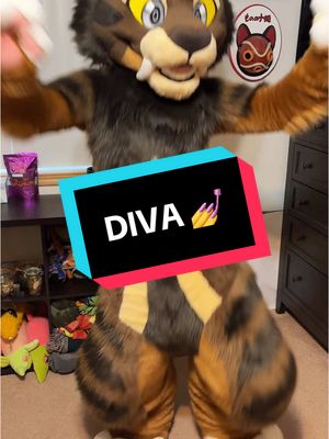 A post by @miles_saber on TikTok caption: Hes a little DIVA 💅✨ @‼️𝑟𝑦𝑎𝑛‼️ makes a great saber! . . Suit made by Multicolorbark! #furryfandom #furrytiktok #multicolorbark #saberfursuit #furry 