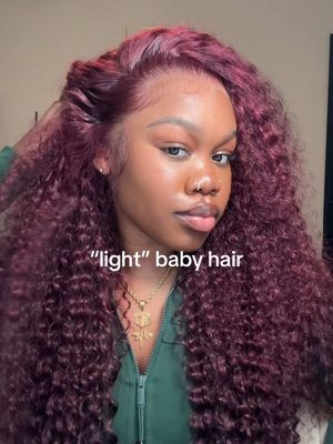 A post by @ebonyrosaa on TikTok caption: Soft/light baby hair @Megalookhair @Megalook Hair 13x4 lace frontal dark purple color deep wave wig #megalookhair #megalook