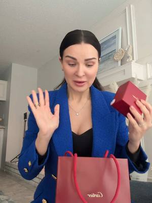 A post by @irinakustorovskaya on TikTok caption: #картье #cartier #louisvuittonbag #ysl #упаковка #розпаковка #картье #луивитон #ивсенлоран #живувсша #нашивсша #украинцывсша 