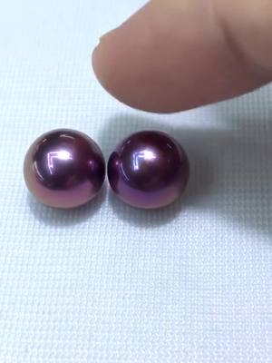 A post by @legendearjewelry on TikTok caption: Have you ever seen this color before? #freshwaterpearl #edisonpearls #bigpearl #purplepearl 