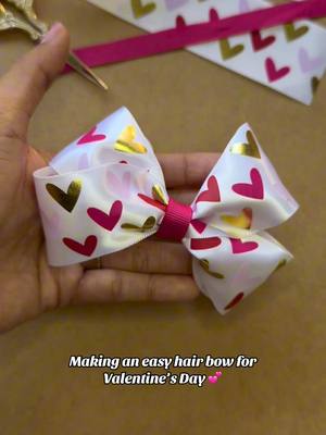 A post by @monicacraftsitall on TikTok caption: Obsessed with the ribbons you find at @Hobby Lobby, and no I didn’t get paid for this, I simply love their ribbons 💕. Valentine’s hair bow tutorial #hairbowtutorial #hairbowdiy #bowdiy #ribbon #moño #liston 