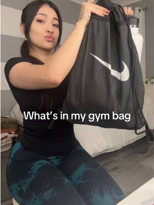 A post by @xxo.mell on TikTok caption: What’s in my gym bag that no one asked for #fyp #gym #GymTok #gymbag #whatsinmybag 