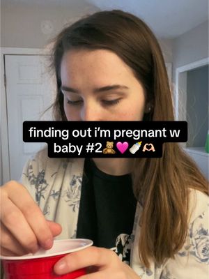 A post by @highki.lit on TikTok caption: i waited all day to tell daniel. it was SOOO hard 🤣🩷 we are so beyond excited omg #momlife #pregnant #foryoupage 