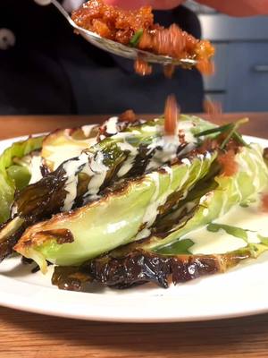 A post by @thomas_straker on TikTok caption: Hispi Cabbage, Anchovy Dressing, Crispy Bread Crumbs #eattheseason #cabbage 