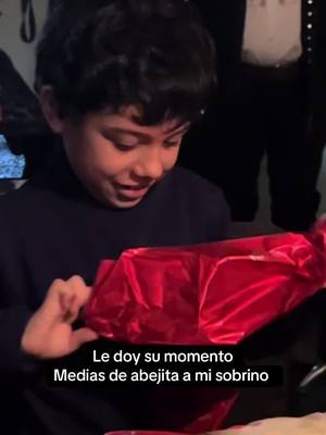 A post by @ on TikTok caption: Feliz de ver esa carita contenta al ver sus monitos 🥹❤️‍🩹#mediasdeabejita #regalo #sobrino 