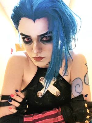 A post by @parkercospaige on TikTok caption: Jinx reveal! 💗🦈💙 Since tiktok is going away, my ig is parkercospaige.  thank u guys for an amazing ride💙 #jinx #jinxcosplay #arcane #arcanecosplay #leagueoflegends 