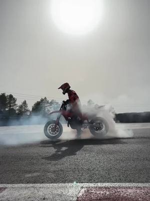 A post by @motoshop.ua on TikTok caption: Smokin' and slidin' your way through Sunday on the KTM 450 SMR. #KTM #ReadyToRace #KTM450SMR #Supermoto *Prototype machine - pre-production graphics 