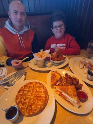 A post by @k3vingabor on TikTok caption: #brunch #pancakes #waffles #fypシ゚viral #father #son #duo #lunchtime #explore #viraltiktok 