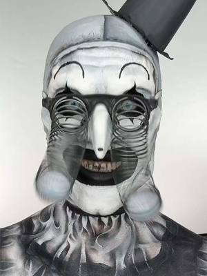 A post by @hollymurraymakeup on TikTok caption: Drop on by The Clown Cafe! Terrifier Art The Clown inspired! 😱 who should I create next?! 