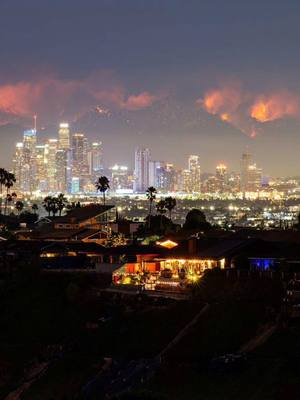 A post by @hollywoodundead on TikTok caption: I first saw the smoke over downtown and thought nothing of it, another random fire. Then that night the wind got so bad it was knocking over trees right in front of us. I thought I was seeing green lightning all over the city/mountains but it was electrical transformers blowing up everywhere. All that caused the fires to get out of control. The next few days looked like Armageddon in the sky, raining ash all over the city. Places we’ve been going to since we were kids are gone. I spent a lot of time at my mother’s place in the city of Altadena, which got hammered by the Eaton fire. Memories and peoples homes all reduced to ash. I have personally donated time to fire fighters in the past with SoCal wild fires and have put out spot fires on mountain sides. When it’s right infront of you, you see how out of control it really is. Let’s hope the people who lost everything and some their lives, find some peace at the end of this -JD #lalives 