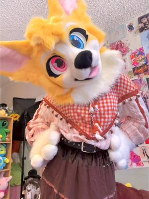 A post by @kikichaoscreations on TikTok caption: Now who is this diva??  Ready to head on home, Layla the corgi is all done!! #furry #fursuit #fursuitmaker #fursuiter #furryfandom #furryfyp #fursuiting 