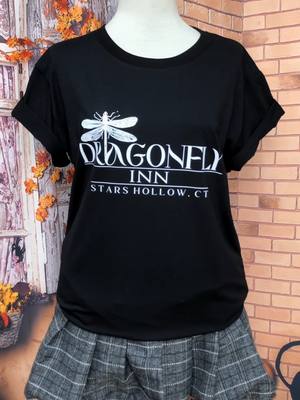 A post by @urbantrendsus on TikTok caption: Available now ❤❤ #dragonflyinn #starshollow #tvshowmerch #cozysweatshirt #fanstyle #giftfortvfans #tiktokshoppingpaydaysale #trendysweater #gilmoregirls #holidayhaul #gilmore #rorygilmore #loreleigilmore #emilygilmore #christmasgift #dragonflyinn #starshollow #lukedanes 