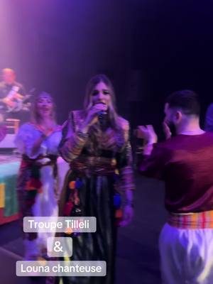 A post by @troupetilleli on TikTok caption: @Louna chanteuse #naimatilleli #kabyle #CapCut #tiziouzouⵣimazighen💛💚 #robekabylemoderne #kabyle_girl #leskabyles💞 #algerienne #algerie 