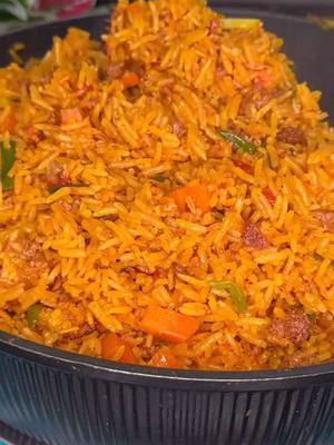 A post by @sweetohemaa1st on TikTok caption: Try this palm oil jollof and thank me later #@Kamaq ZomiWura 