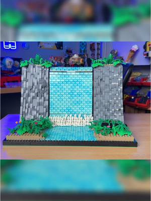 A post by @ethan.the.artisan on TikTok caption: I built a working LEGO Waterfall…💦🌊💧