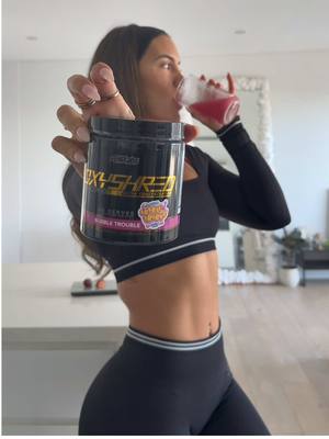 A post by @kelsiefaiththomas on TikTok caption: OXYSHRED hardcore for those days u need that extra boost - new flavour bubble trouble 😈 🫧 @ehplabs code / KELSIE #fyp #GymTok #oxyshred 