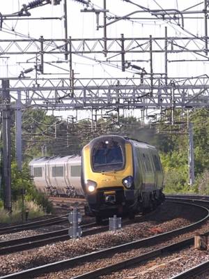 A post by @theukrailwayguy on TikTok caption: AWC Voyagers thrashing past Bushey heading to Ldn Euston #class221 #awc #voyager #wcml #bushey #trains #train #railway #fyp #foryou #viral #blowup #theukrailwayguy 