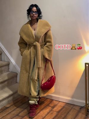 A post by @denahabib1 on TikTok caption: nudes with pops of red🍒are yall sick of me wearing this coat yet?!?🤭😂 #fyp #fypシ #blackgirlmagic #habeshatiktok #fashion #fashiontiktok #outfitinspo #outfitideas #outfit #fitcheck #zaracoat 