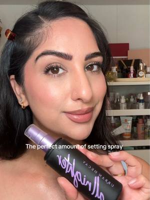 A post by @sukhikmann on TikTok caption: The perfect amount of setting spray @urban decay #urbandecay #settingspray #makeuphacks 