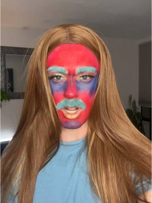 A post by @glernndevern on TikTok caption: Figured I had to do this while I still have my facial hair. Thank you for the inspiration @brynne #colormemonday #countrydrag #makeup  Products used: White Concealer - PRO.conceal @L.A. Girl Cosmetics  Face Paint - Paradise Makeup AQ @Mehron Makeup  Silver Eyeshadow - UD Prince @urban decay 