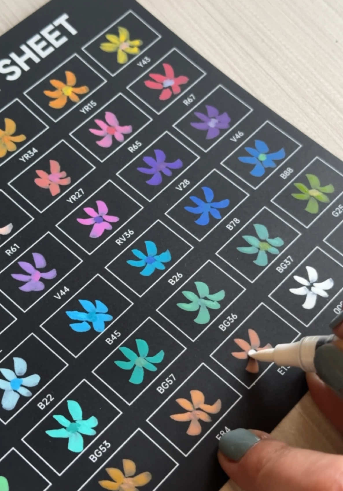 A post by @jessicayoungart on TikTok caption: Who said marker swatch cards have to be boring?? Also these markers are so dreamyyyy and creamyyy 🌼 #markers #acrylicpaintpens #acrylicpaint #acrylicpainting #artist #artstudio #shuttleart #Art 