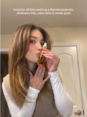 A post by @renatajimenezv on TikTok caption: My fav before & after styling oil from OURO 🙌🏼✨