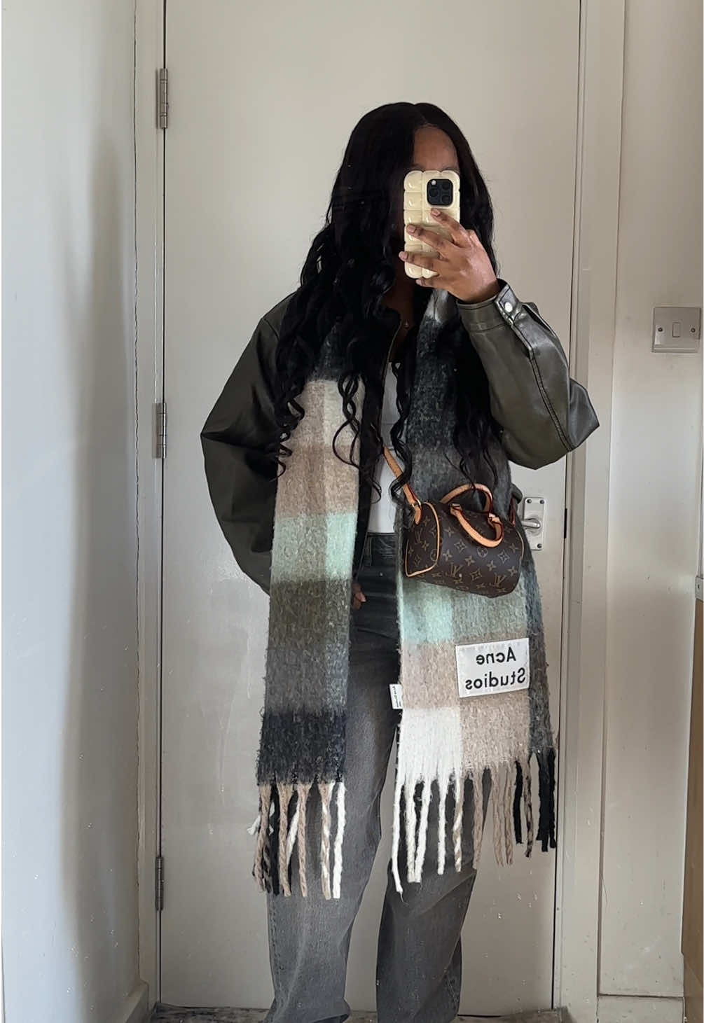 A post by @stephaniethemuse on TikTok caption: Going to be sharing more finds on my IG: @stephaniehthemuse_ 🫶🏾#ootd #scarfoutfitideas #outfitideas #jeansoutfit 