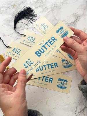 A post by @ystreetstudio on TikTok caption: My printer decided to take some creative liberties with the font color but I still like how they turned out! #butter #bookmarks #diybookmark #easydiy #giftideas