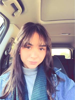 A post by @devynonearth on TikTok caption: i love my bangs #fyp #bangs 