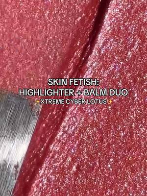 A post by @patmcgrathreal on TikTok caption: The Skin Fetish: Xtreme Highlighter + Balm Duo in ‘CYBER LOTUS…  the most STUNNING translucent coral hue with pink-blue reflex pearls. Who else is OBSESSED!?🌸 💫🌸