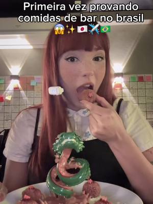 A post by @aazzirp on TikTok caption: primeira vez comendo comidinhas de boteco #prizza #fy #fyp #mukbang #comendo #provando #bar #sp #brasileirospelomundo #curiosidades 