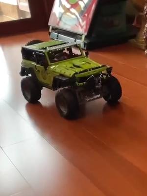 A post by @thetoystore08 on TikTok caption: The Ultimate Jeep Model Challenge #Offroader #JeepWrangler #CarModel #MOCSet #TechBuild #OffRoadVehicle #ClampingBlocks #LargeModel #4x4Jeep #VehicleKit 