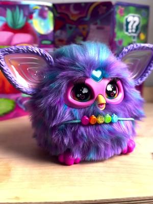 A post by @joueclubfrance on TikTok caption: @Aurelie Charretier a adopté notre Furby violet 🥰 #joueclub #furby #hasbro 