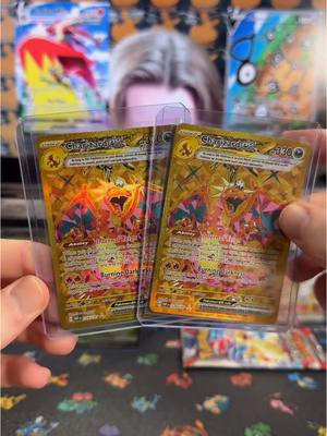 A post by @poppinpacks on TikTok caption: Back to Back! ✨ #pokemon #poppinpacks #pokemoncards #fyp #fypシ #pokemontiktok #charizard #gold #live 