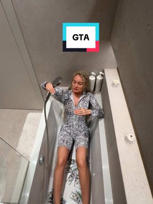 A post by @gtamillionnata on TikTok caption: Money shower 🤣😅 #gtamillionnata 